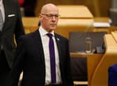 Temporary Cabinet Secretary for Finance and Economy John Swinney delivers the Scottish Budget for 2023-24 to the Scottish Parliament (Picture: Andrew Cowan/Getty)