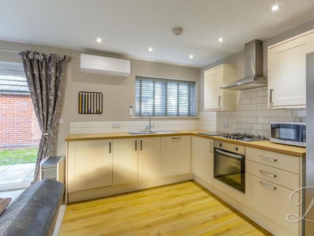 This is the shaker-style kitchen section of the open-plan hub. Estate agents BuckleyBrown describe it as "enviable", with its range of modern units, cabinets and worktops, and its handy, integrated appliances, including oven and dishwasher. There is also an inset sink and drainer, gas hob with stainless steel extractor fan, space for a double fridge/freezer and laminate flooring.