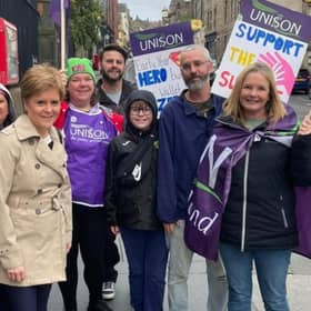 The former first minister was pictured with striking school staff