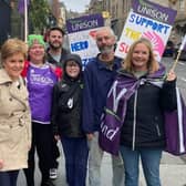 The former first minister was pictured with striking school staff