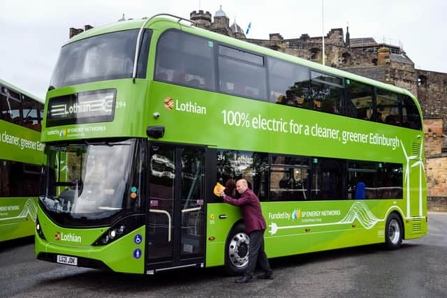 Bus driver Gabor Nemeth with one of the new double deckers on Edinburgh Castle Esplanade. Picture: Ian Georgeson Photography