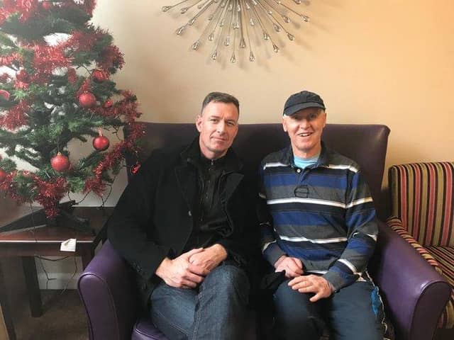 Touching tribute: Chris Sutton posted a picture of himself with his late father Mike on Twitter
