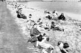 Evening News and Dispatch ramblers take a rest by the Harlaw Reservoir, near Balerno, in June 1966.