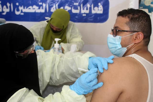 A medical worker receives a dose of the AstraZeneca Covid vaccine in Aden, southern Yemen (Picture: Saleh Obaidi/AFP via Getty Images)
