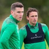 Hibs captain Paul Hanlon (L) is delighted to see Scott Allan (R) back in the mix for the Easter Road club. Photo by Ross MacDonald / SNS Group