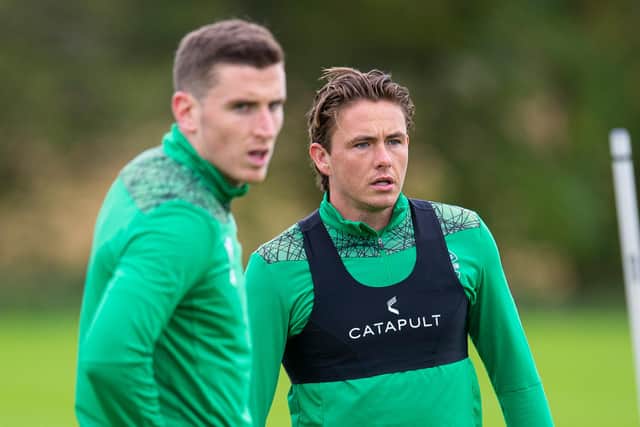 Hibs captain Paul Hanlon (L) is delighted to see Scott Allan (R) back in the mix for the Easter Road club. Photo by Ross MacDonald / SNS Group
