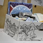The baby boxes given to Scotland's new mothers contain a mattress, fitted sheet and blanket, clothes from newborn up to the age of 6 months, a bath towel, a travel changing mat, muslin cloth squares and a bib (Picture: Scottish Government/PA)