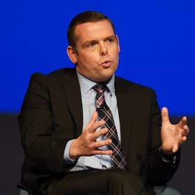 Douglas Ross suggested it was “absurd” for Nicola Sturgeon to claim her decision to stand down as SNP leader isn’t linked to the arrest of her husband.
