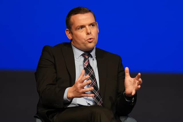 Douglas Ross suggested it was “absurd” for Nicola Sturgeon to claim her decision to stand down as SNP leader isn’t linked to the arrest of her husband.
