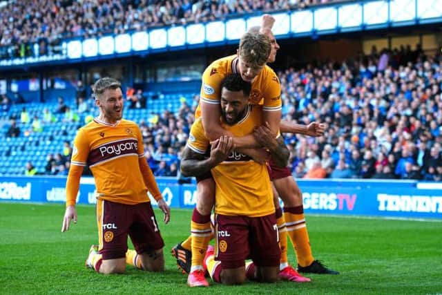 Motherwell striker Kaiyne Woolery celebrates his equaliser against Rangers at Ibrox. (Photo by Craig Foy / SNS Group)