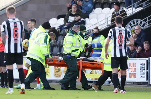 Jamie McGrath is taken from the field on a stretcher after suffering an injury during St Mirren's 2-1 defeat at home to Rangers. (Photo by Craig Williamson / SNS Group)