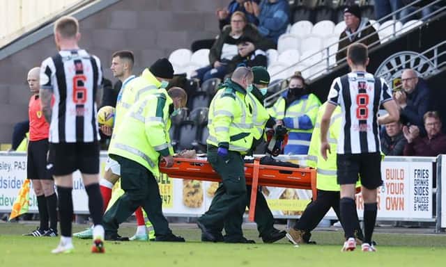 Jamie McGrath is taken from the field on a stretcher after suffering an injury during St Mirren's 2-1 defeat at home to Rangers. (Photo by Craig Williamson / SNS Group)
