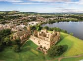 The ruins of Linlithgow Palace and St. Michael's church from the air. Linlithgow, West Lothian, Scotland.