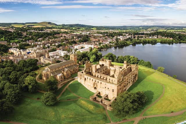 The ruins of Linlithgow Palace and St. Michael's church from the air. Linlithgow, West Lothian, Scotland.