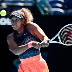 Naomi Osaka of Japan plays a backhand in her women’s singles semi-finals match against Serena Williams of the United States during day 11 of the 2021 Australian Open at Melbourne Park on 18 February 2021. (Pic: Getty Images)