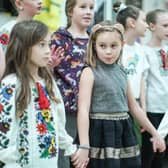 Refugee children from Ukraine perform aboard the MS Victoria ship in Leith, where many families fleeing the war lived after arriving in Scotland. Picture: Getty Images