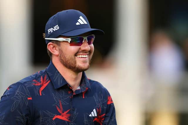 Connor Syme reacts after putting on the 18th green during day three of the BMW PGA Championship at Wentworth Club. Picture: Andrew Redington/Getty Images.