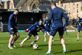 Billy Gilmour and John McGinn during a Scotland training session at Lesser Hampden on Tuesday.