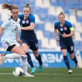 Martha Thomas is pressured by Slovakia's Diana Lemešová during the Pinatar Cup match between Scotland and Slovakia. (Photo by Jose Breton / SNS Group)