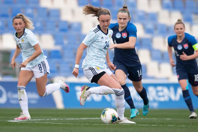 Martha Thomas is pressured by Slovakia's Diana Lemešová during the Pinatar Cup match between Scotland and Slovakia. (Photo by Jose Breton / SNS Group)