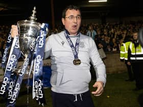 LARBERT, SCOTLAND - MAY 05: Dundee manager Gary Bowyer with the trophy during a cinch Championship match between Queen's Park and Dundee at Ochilview Park, on May 05, 2023, in Larbert, Scotland. (Photo by Alan Harvey / SNS Group)
