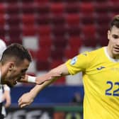 Darius Olaru has six caps for Romania having represented his country at under-21 level. (Photo by ATTILA KISBENEDEK/AFP via Getty Images)