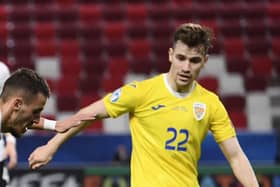 Darius Olaru has six caps for Romania having represented his country at under-21 level. (Photo by ATTILA KISBENEDEK/AFP via Getty Images)