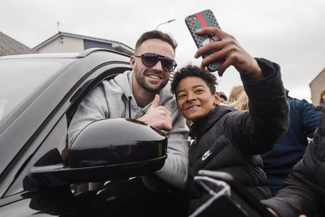 Josh Taylor arrives in his hometown of Prestonpans in East Lothian. (Credit: Euan Cherry)