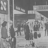 Where pedestrians walked above the cars. A new pedestrian deck sits over Nicolson Street with a view opening up towards Old College. Illustration by Alexander Duncan Bell from the Collection of Clive Fenton, University of Edinburgh.