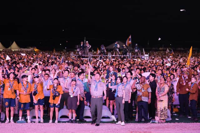 South Korea's President Yoon Suk Yeol and his wife Kim Keon Hee throwing paper airplanes during the opening ceremony of the 25th World Scout Jamboree in Saemangeum, about 180 km southwest of Seoul. Pic: AFP Photo/South Korean Presidential Office