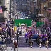 Cast take part in a parade scene on St Vincent Street in Glasgow, during filming for what is thought to be the new Indiana Jones 5 movie starring Harrison Ford picture: Andrew Milligan/PA