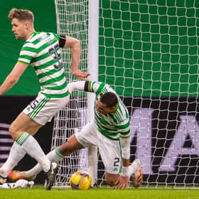 Christopher Jullien collides with the posts and suffers an injury during Celtic's win over Dundee United. Picture: SNS