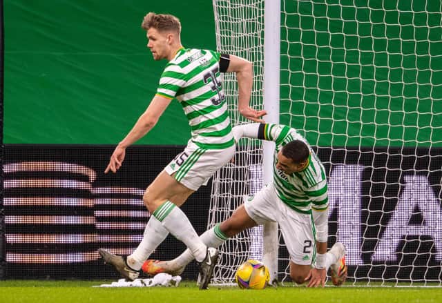 Christopher Jullien collides with the posts and suffers an injury during Celtic's win over Dundee United. Picture: SNS