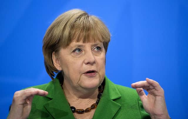 Did then Chancellor Angela Merkel play into Vladimir Putin's hands by killing Germany's nuclear energy programme? (Picture: Johannes Eisele/AFP via Getty Images)