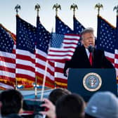 Donald Trump speaks to supporters at Joint Base Andrews before boarding Air Force One for his last time as US president on 20 January 2021. (Pic: Getty Images)