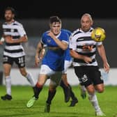 Ayr United's Michael Moffat (right) competes with Robbe Ure during an SPFL Trust Trophy match between Rangers B and Ay United at the C&G Systems Stadium on September 14, 2021, in Dumbarton, Scotland.  (Photo by Craig Foy / SNS Group)