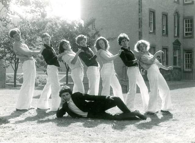 1976 Oxford Revue - Monica Kendall, third from the left, with Richard Curtis in front of her and Rowan Atkinson on the grass