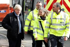 Prime Minister Boris Johnson visits Bewdley in Worcestershire to see recovery efforts following recent flooding in the Severn valley.