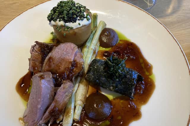 A tender lamb rump with a stack of Lyonnaise potato, farce (kale-wrapped truffle and celeriac sausage) and sauce. Pic: Fiona Laing
