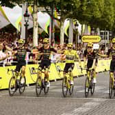 Danish star Jonas Vingegaard of Jumbo-Visma crosses the finish line of the 21st and last stage of this year's Tour de France. Photo by David Pintens/Getty Images