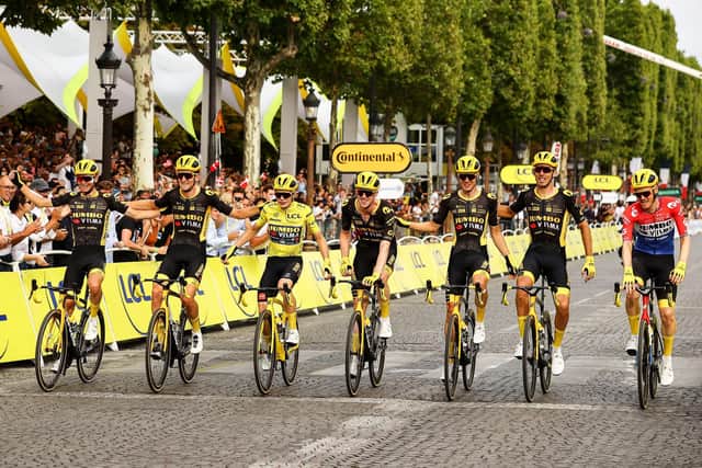 Danish star Jonas Vingegaard of Jumbo-Visma crosses the finish line of the 21st and last stage of this year's Tour de France. Photo by David Pintens/Getty Images