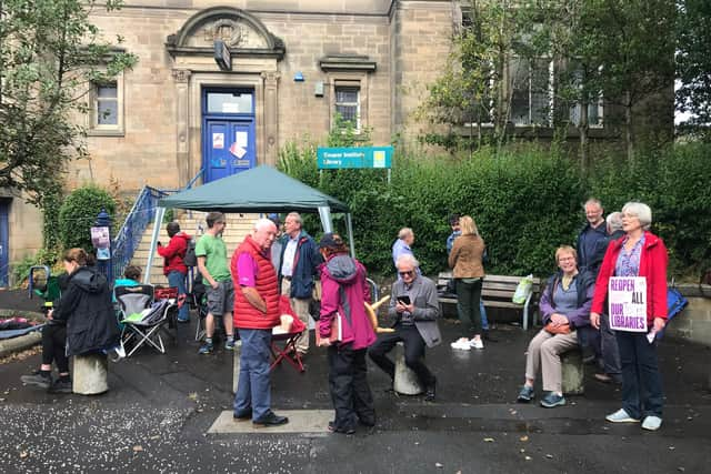 A recent rainy day read-in at the Couper Institute with the gazebo up.