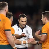 Referee Mathieu Raynal speaks to Nic White and Bernard Foley of the Wallabies during the Bledisloe Cup match with New Zealand in Melbourne in September. (Photo by Cameron Spencer/Getty Images)