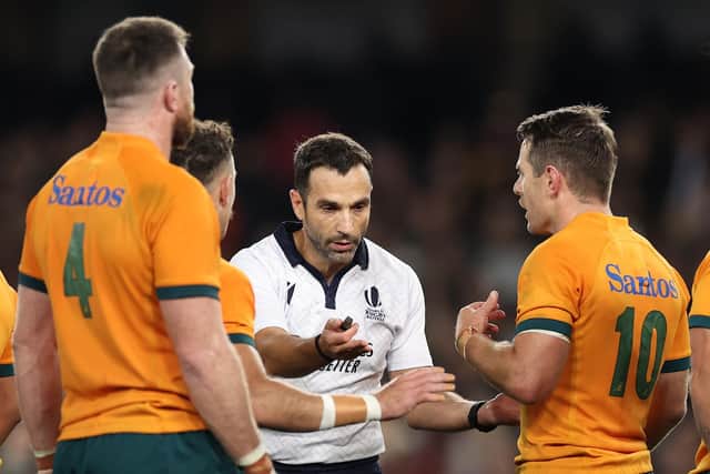 Referee Mathieu Raynal speaks to Nic White and Bernard Foley of the Wallabies during the Bledisloe Cup match with New Zealand in Melbourne in September. (Photo by Cameron Spencer/Getty Images)