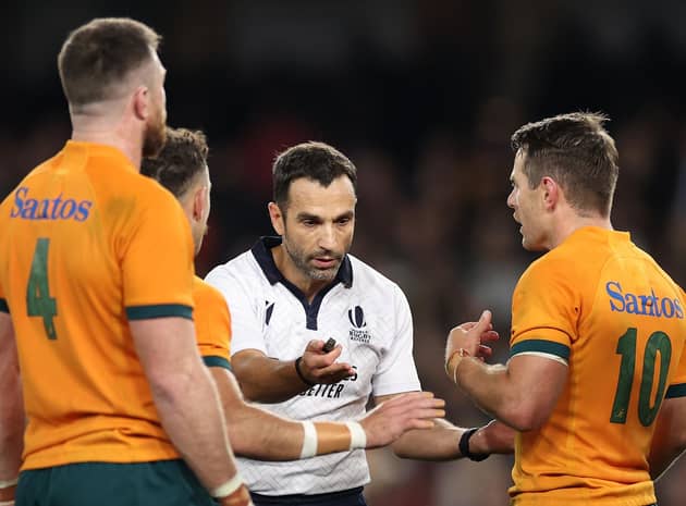 Referee Mathieu Raynal speaks to Nic White and Bernard Foley of the Wallabies during the Bledisloe Cup match with New Zealand in Melbourne in September. (Photo by Cameron Spencer/Getty Images)