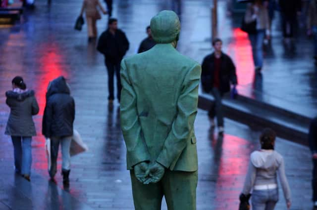 The Statue of Former First Minister Donald Dewar one of the founding fathers of Devolution