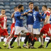 Rangers and Slavia Prague players clash on the pitch at Ibrox during the Europa League last 16 clash.  (Photo by Alan Harvey / SNS Group)