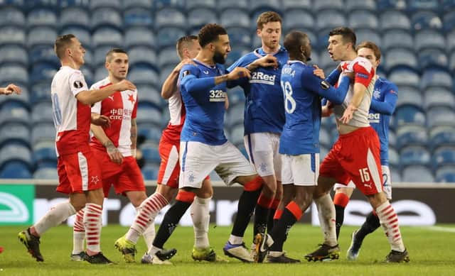 Rangers and Slavia Prague players clash on the pitch at Ibrox during the Europa League last 16 clash.  (Photo by Alan Harvey / SNS Group)