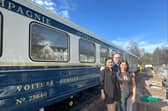 Isara, Fergus and Mia McCallum beside the carriage in the Pitlochry Station car park. (Photo by The Wee Choo-Choo)