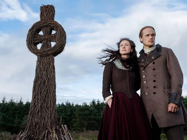 Caitriona Balfe as Claire Randall and Sam Heughan as Jamie Fraser from Outlander. A church connected to the series has gone up for sale. Picture: Starz!/Kobal/Shutterstock